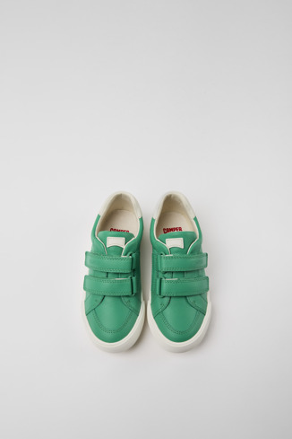 Overhead view of Pursuit Green and white sneakers for kids