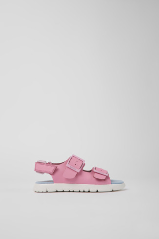 Side view of Oruga Pink leather sandals for kids