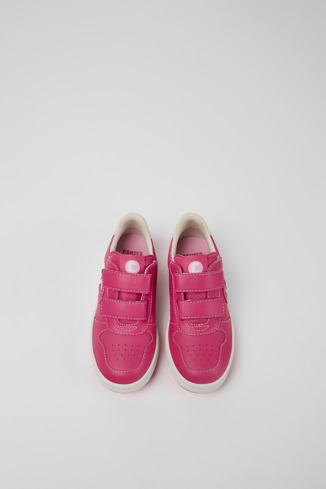 Overhead view of Runner Pink and white leather sneakers for kids