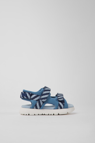 Side view of Oruga Blue textile sandals for kids