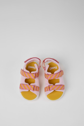 Overhead view of Oruga Pink and orange textile sandals for kids