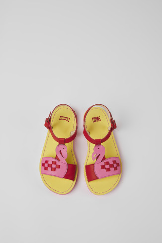 Overhead view of Twins Red and pink leather sandals for kids