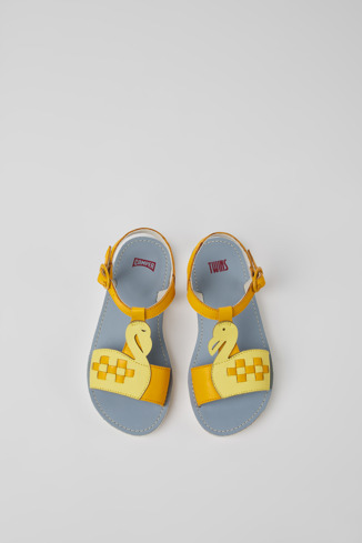 Overhead view of Twins Yellow and orange leather sandals for kids
