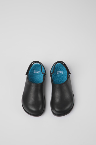 Overhead view of Brutus Black leather clogs for kids