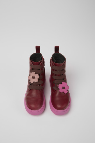 Overhead view of Twins Burgundy and pink leather lace-up boots