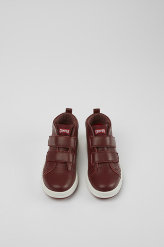 Overhead view of Runner Burgundy and white leather sneakers