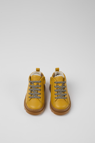 Overhead view of Brutus Yellow leather lace-up boots
