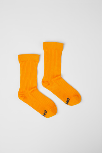 Side view of Calma Socks PYRATEX® Orange socks in collaboration with PYRATEX®