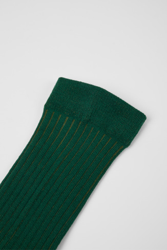 Close-up view of Calma Socks PYRATEX® Green socks in collaboration with PYRATEX®