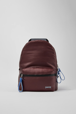 Side view of Ado Burgundy recycled nylon backpack