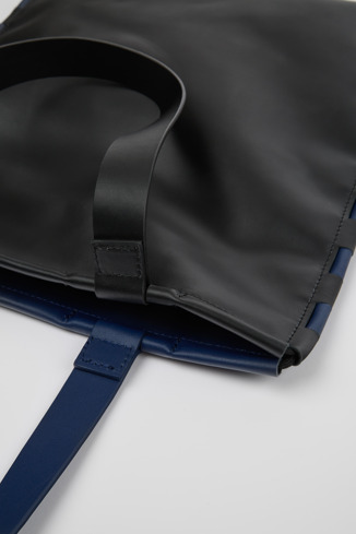 Close-up view of Tie Bags Blue and black flat tote bag