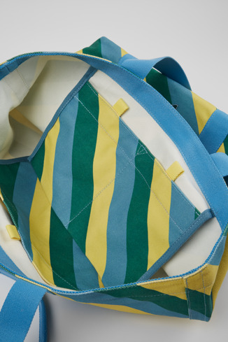 Close-up view of Ado Yellow, blue, and green recycled cotton tote bag