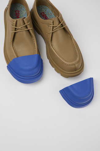 Close-up view of Junction Toe Caps Blue Synthetic boot Cap