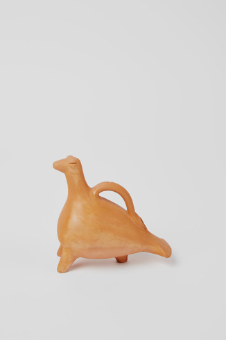 Side view of Pigeon-shaped baby feeder Handcrafted terracotta baby feeder