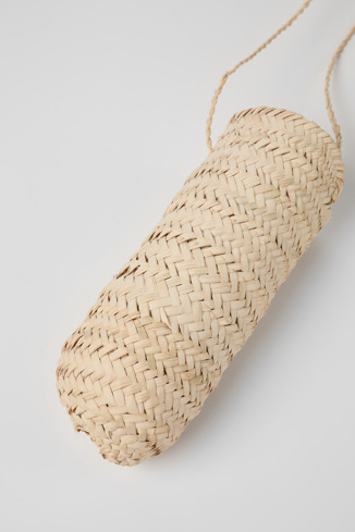 Close-up view of Esparto bottle bag Handwoven esparto bottle bag