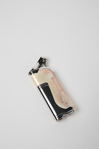 Close-up view of 1 vintage lighter Vintage metal novelty lighter