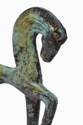 Close-up view of Greek horse Metal horse statuette