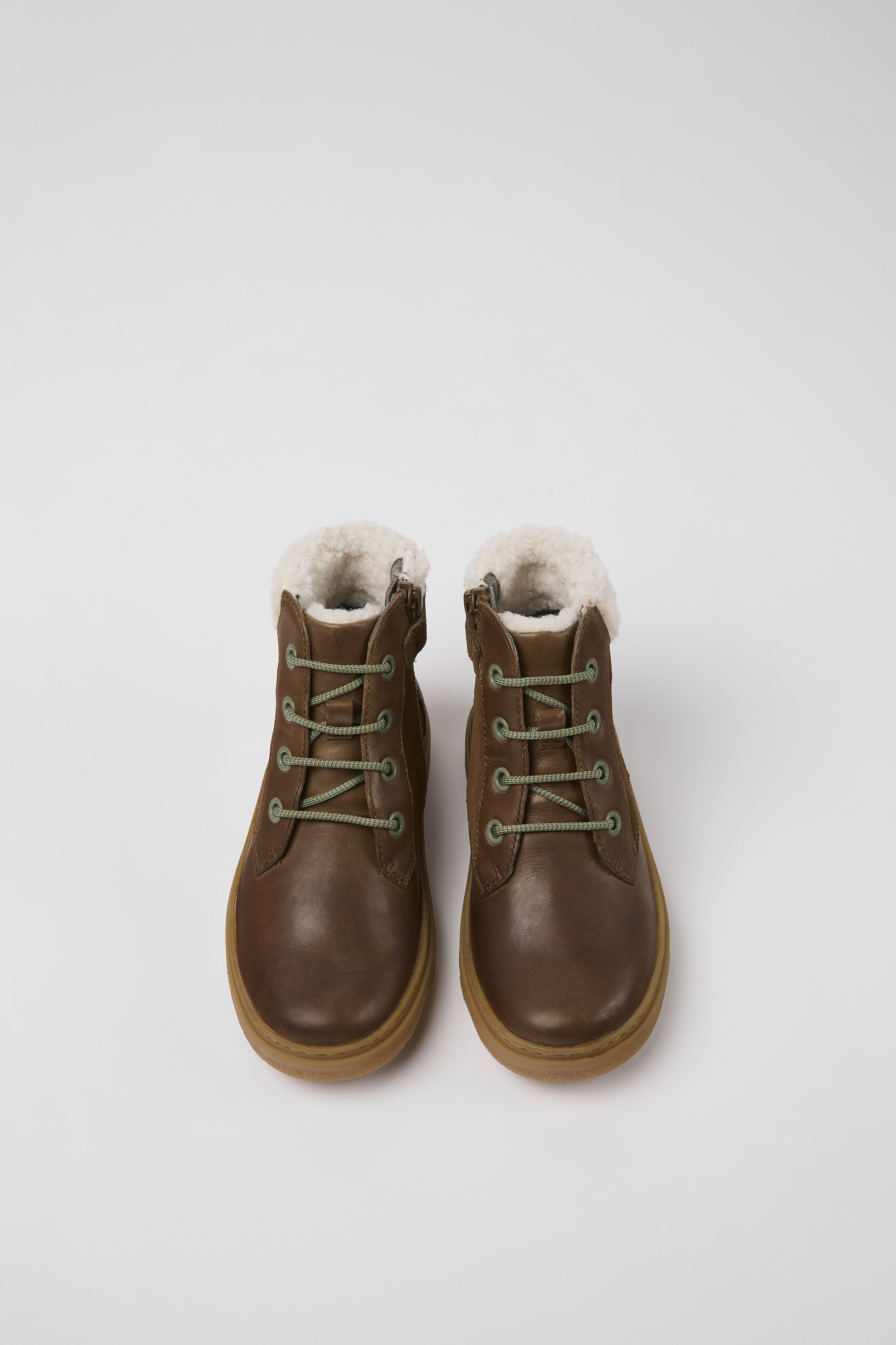 Brown leather hotsell fur lined boots